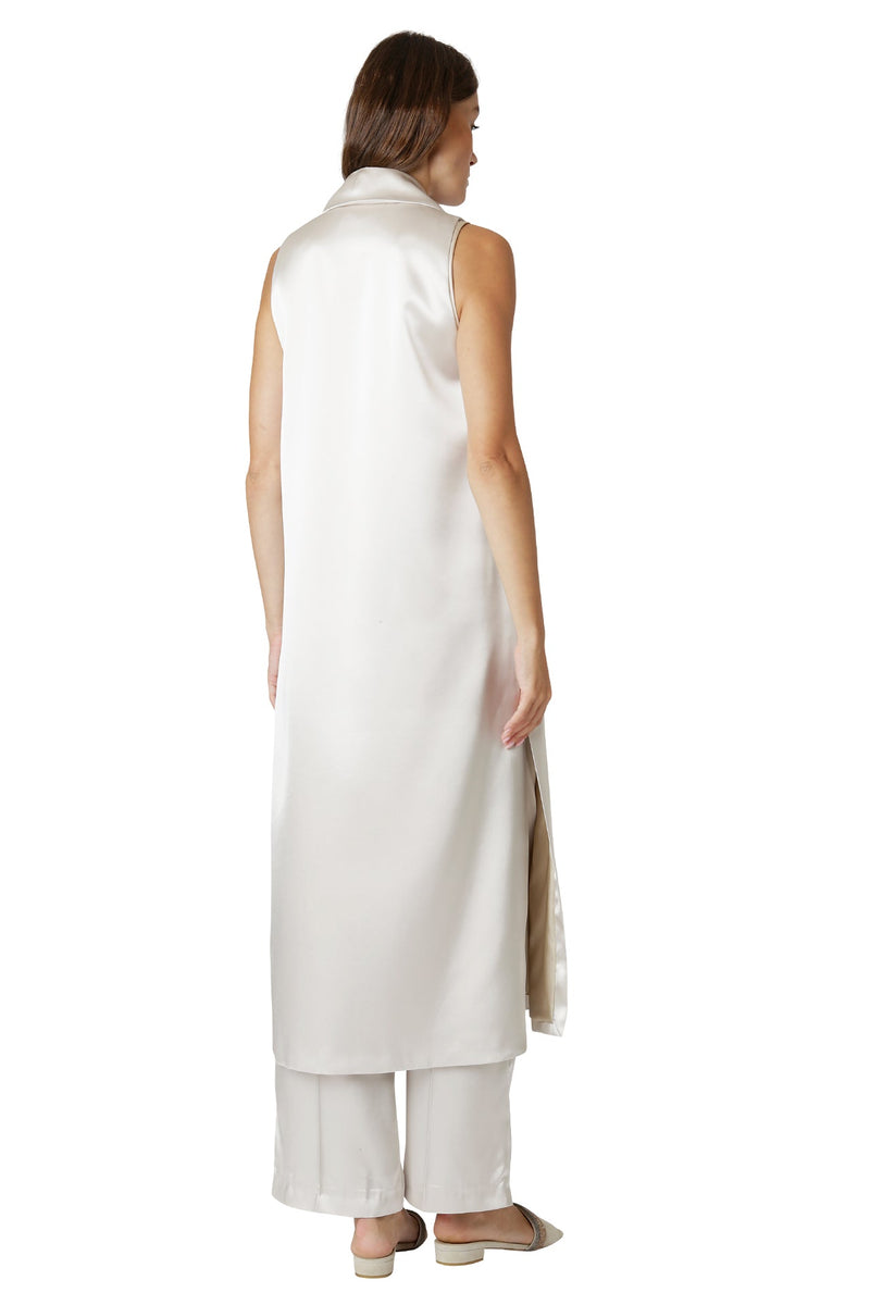 SLEEVELESS DUST COAT